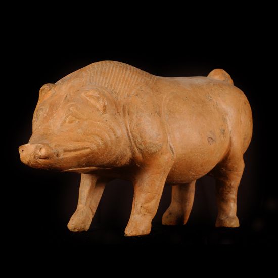 Scultura modellata nella forma di un maiale